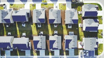 Aerial view of houses in a suburban area.